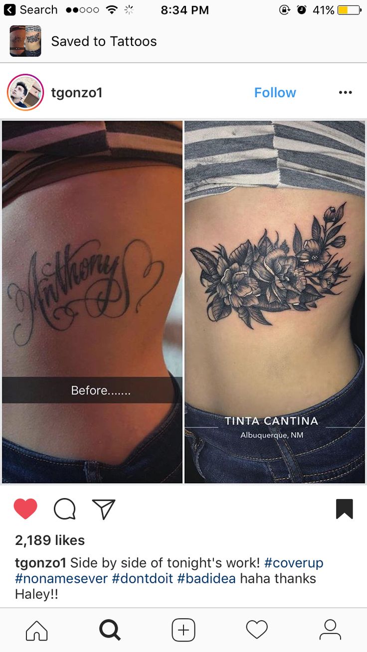 the back of a woman's stomach with two tattoos on it and one has flowers