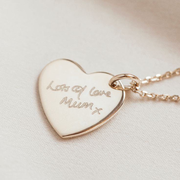 "A handmade heart or circle charm necklace in silver, rose gold or gold personalised with your writing. A unique and stunning gift for any jewellery lover, this personalised bar necklace is simple yet carries so much meaning- the perfect present for birthdays, anniversaries, graduation and more. Available in Sterling silver, Rose gold and Yellow gold Plate (over silver) Text will be scaled to fit. Do contact us if you need any help or advice. * * * How we get your handwriting * * * 1. Once you have placed your order, consider the handwriting you would like to use. Ideally this will be on a clear background. 2. Scan or take a photo of the handwriting in natural light, from directly above, ensuring the lines are clear and there is little to no gradient in the image. 3. Please send us your ha Hand Stamped Sterling Silver Necklace In Rose Gold, Rose Gold Hand Stamped Sterling Silver Necklace, Rose Gold Sterling Silver Hand Stamped Necklace, Rose Gold Sterling Silver Necklace With Hand Stamped Details, Meaningful Charm Necklaces For Anniversary, Heart Charm Necklace For Anniversary, Minimalist Charm Necklace For Mother's Day Anniversary, Meaningful Rose Gold Necklace For Valentine's Day, Rose Gold Sterling Silver Charm Necklace For Anniversary