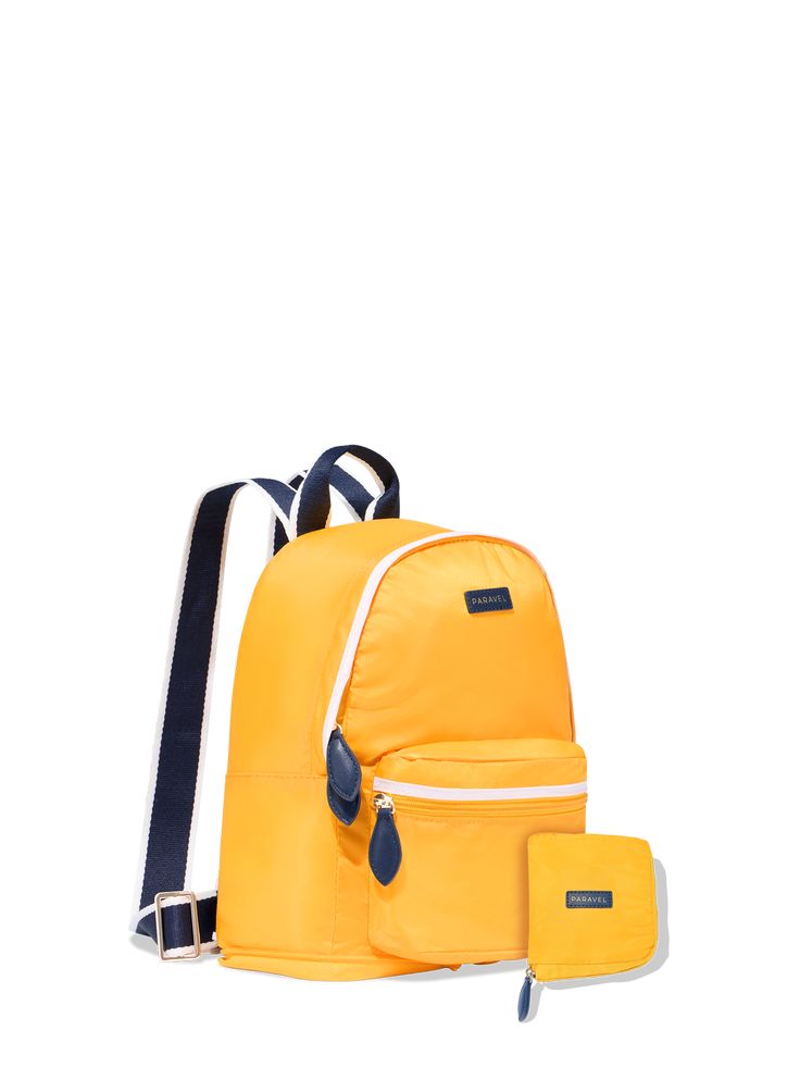 A mini version of our full-size backpack, perfectly sized for festivals or afternoons out. Our Mini Fold-Up Backpack, made of our water-resistant Negative Nylon®, is ultra-lightweight, durable and storage-friendly. A use-everyday kind of backpack with a twist of magic: it folds up flat and zips into a barely-there pouch. Pack it up. Fold it up. And go. All sales are final. Packable Nylon Backpack For Everyday Use, Packable Nylon Backpack, Everyday Nylon Packable Backpack, Casual Travel Backpack Packable, Casual Packable Backpack For Travel, Casual Packable Standard Backpack, Sporty Standard Backpack For Summer, Packable Backpack For School, Versatile Nylon Backpack For Back To School