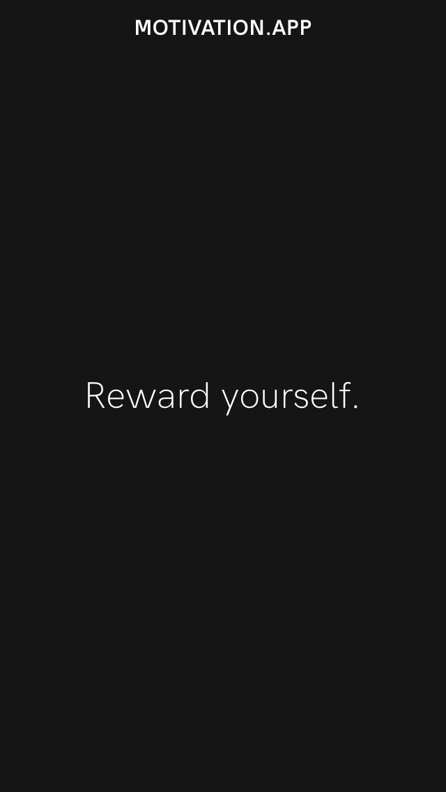 a black and white photo with the words reward yourself written on it, in front of a dark background