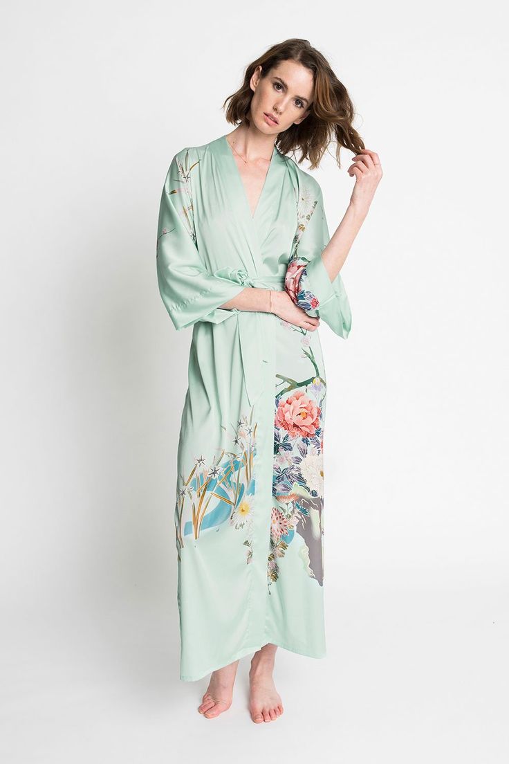 KIM + ONO Spring Floral Long Kimono Robe – kimandono.com Spring Maxi Kimono With Tie Waist, Maxi Length Spring Kimono With Tie Waist, Green Wrap Kimono With Tie Waist, Spring Maxi Dress With Tie Waist And Kimono Sleeves, Spring Kimono With Tie Waist And Kimono Sleeves, Spring Maxi Length Robe For Loungewear, Bohemian Floor-length Kimono For Spring, Green Floral Print Long Robe, Green Long Floral Print Robe