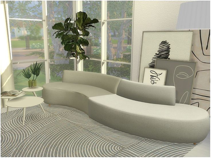 a white couch sitting in front of a window next to a table with a potted plant on it