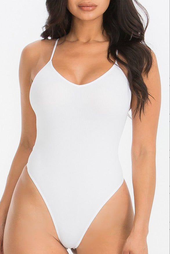 Soft and stretchy seamless bodysuit 92% Nylon, 8% Spandex Model is 5’7 and is wearing a size S/M Plus Size Model Outfits, Seamless Bodysuit, Spaghetti Strap Bodysuit, Ruffle Tube Top, Cheeky One Piece Swimsuit, Basic Bodysuit, Cami Bodysuit, Crochet Shorts, Adore Me