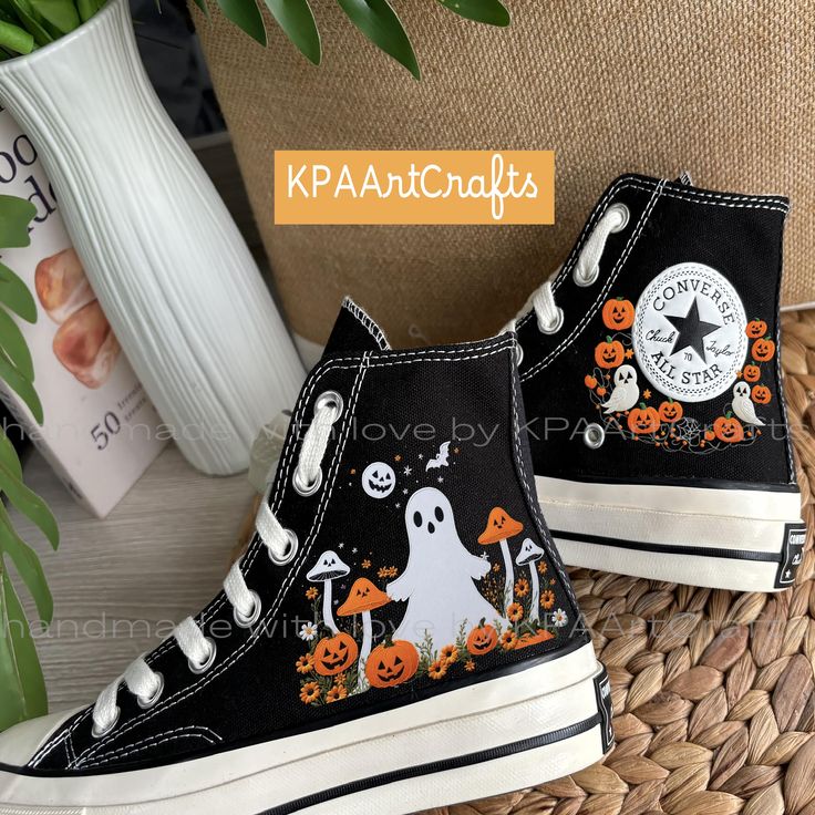 Mushroom Ghost Hand Embroidery Converse, Spooky Boo Embroidered  Hi Top Shoes, Custom Halloween Cute Ghost Face With Mushrooms and Pumpkins The Mushroom Ghost Hand Embroidery Converse are custom high-top sneakers that feature a whimsical design perfect for Halloween. Each pair showcases a cute ghost face adorned with mushrooms and pumpkins, all intricately hand-embroidered to create a unique and playful aesthetic. These spooky yet charming sneakers are ideal for those looking to express their lo Shoe Design Ideas Diy, Unique Shoes Women, Hand Painted Shoes Ideas, Halloween Converse, Cute Ghost Face, Mushroom Ghost, Embroidery Converse, Cool Converse, Cute Converse Shoes