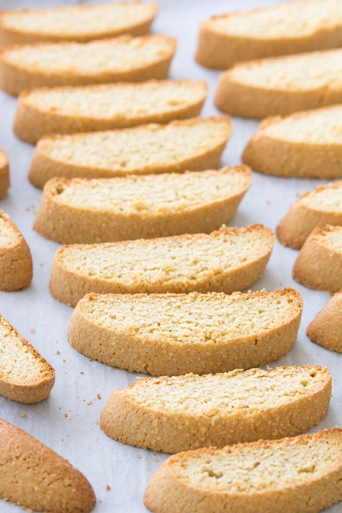 cookies are lined up and ready to be baked on a baking sheet for the oven