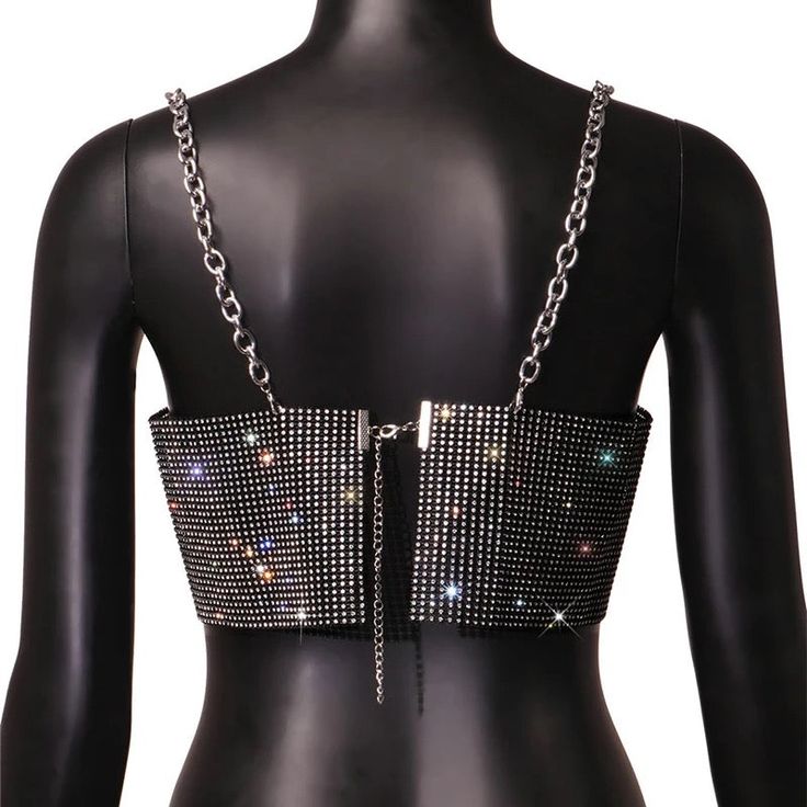 Our EUPHORIA top is a see through top made of rhinestone fishnet fabric. SIZE Bust Waist 26.77-37.40 4.72 Party Mesh Crop Top With Fishnet Details, Elegant Black Rhinestone Crop Top, Party Fishnet Mesh Crop Top, Glamorous Club Crop Top With Rhinestones, Party Mesh Top With Sequins, Black Rhinestone Fringe Top For Evening, Elegant Black Crop Top With Rhinestones, Silver Rhinestone Crop Top For Party, Chic Black Crop Top With Rhinestones