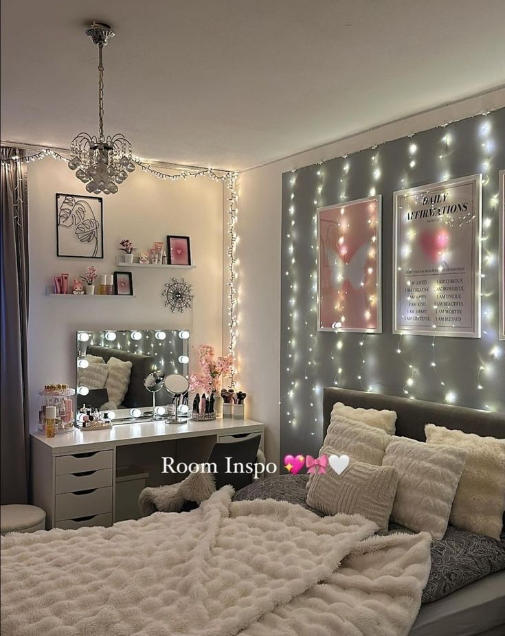 a bedroom with lights on the wall and a bed