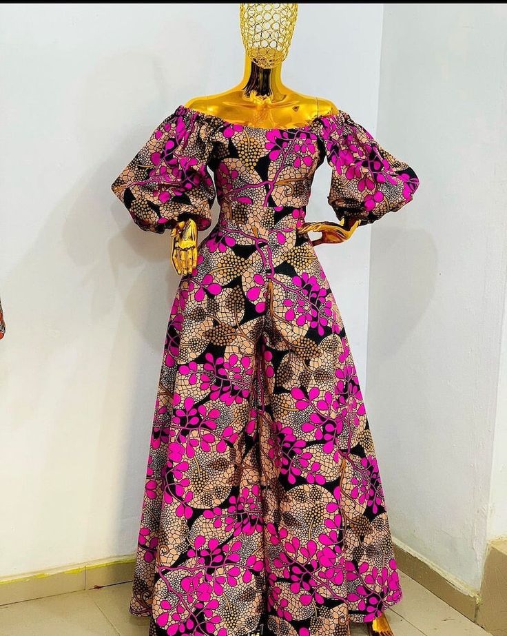 This Ankara dress is a vibrant, floor-length garment crafted from Ankara fabric, known for its bold and colorful African prints. This stylish dress typically features a flattering silhouette, with various sleeve and neckline options. Perfect for both casual and formal occasions, it blends cultural richness with contemporary fashion. For custom fit,provide these measurements, please Bust (in/cm) Waist (in/cm) Hips (in/cm) Biceps (in/cm) Height (ft/cm) Dress Length (in/cm) Women African Dresses, African Midi Dress, Free Gown, African Maxi Dress, Dresses Ankara, African Print Maxi Dress, Ankara Maxi Dress, Ankara Gown, African Maxi Dresses