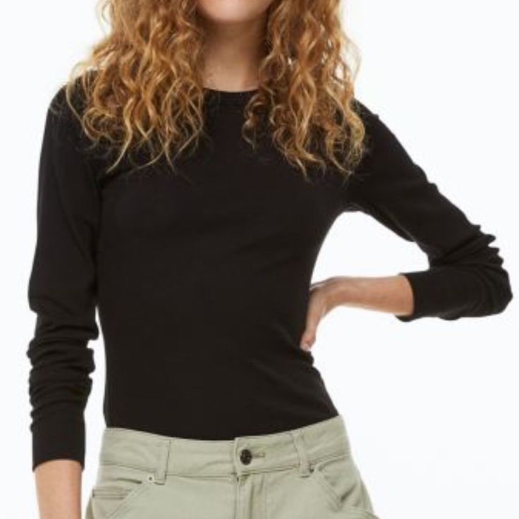 Fitted Top In Soft, Ribbed Cotton And Modal Jersey. Crew Neck And Long Sleeves. Cotton 48%, Modal 47%, Spandex 5% Super Stretchy, Super Comfy, Versatile Ribbed Stretch Knit Top With Crew Neck, Ribbed Stretch Crew Neck Knit Top, Stretch Crew Neck Long Sleeve Top, Stretch Elastane Long Sleeve Crew Neck Top, Stretch Fine Knit Long Sleeve Top For Work, Stretch Elastane Crew Neck Long Sleeve Top, Stretch Fine Knit Crew Neck Top, Casual Ribbed Stretch Long Sleeve Top, Basic Solid Color Stretch Knit Top