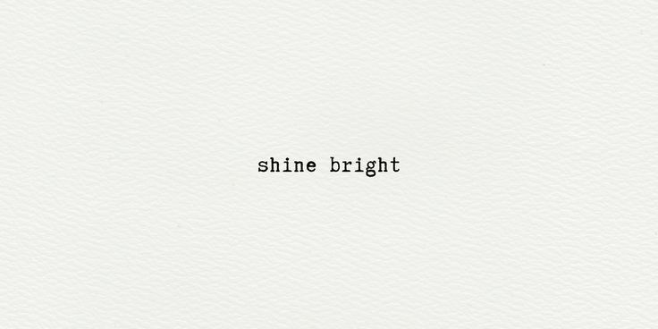 the word shine bright written in black ink on white paper