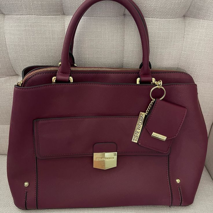 Brand New Office Burgundy Shoulder Bag With Gold-tone Hardware, Burgundy Office Bag With Gold-tone Hardware, Burgundy Shoulder Bag With Gold-tone Hardware For Office, Burgundy Office Bags With Gold-tone Hardware, Chic Burgundy Satchel For Travel, Chic Burgundy Travel Satchel, Burgundy Satchel Shoulder Bag With Gold-tone Hardware, Burgundy Shoulder Bag With Gold-tone Hardware For Shopping, Burgundy Bags With Branded Hardware For Daily Use