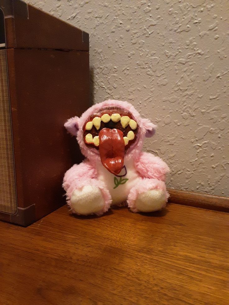 a stuffed animal that is sitting on a table