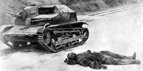 an old tank laying on the ground next to a dead man lying in the road