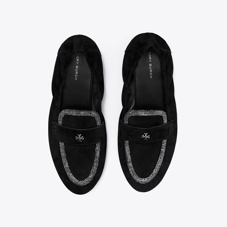 Our Ballet Loafer® is an interpretation of two classics — the flexibility of a ballet slipper with the profile of a loafer. The insole provides performance-level comfort, ruched sides secure the foot and treads on the outsole add traction. It is crafted in suede with a crystal trim and detailed with a Double T in brushed gold. The shoe's edges are hand-painted and the strap is hand-stitched. Crafted in partnership with a Leather Working Group-certified tannery, supporting high standards in leather manufacturing and chemical management. Lug Boots, Crystal Trim, Designer Flats, Ballet Slippers, Footwear Design Women, Black Crystals, Suede Boots, Leather Ankle Boots, Leather Working