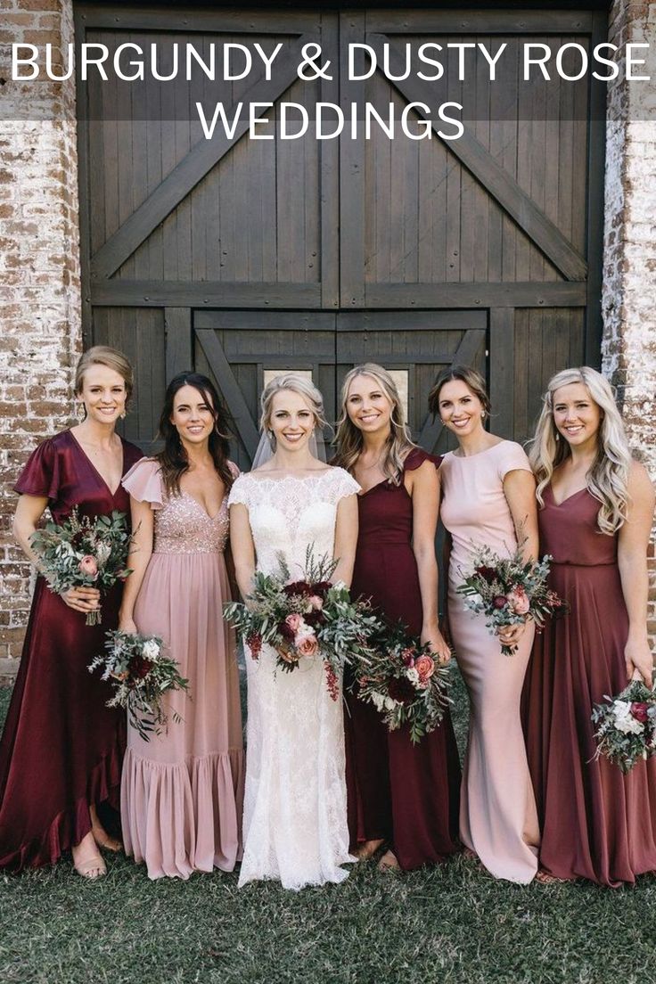 a group of women standing next to each other in front of a barn door with the words burgundy and dusty rose wedding