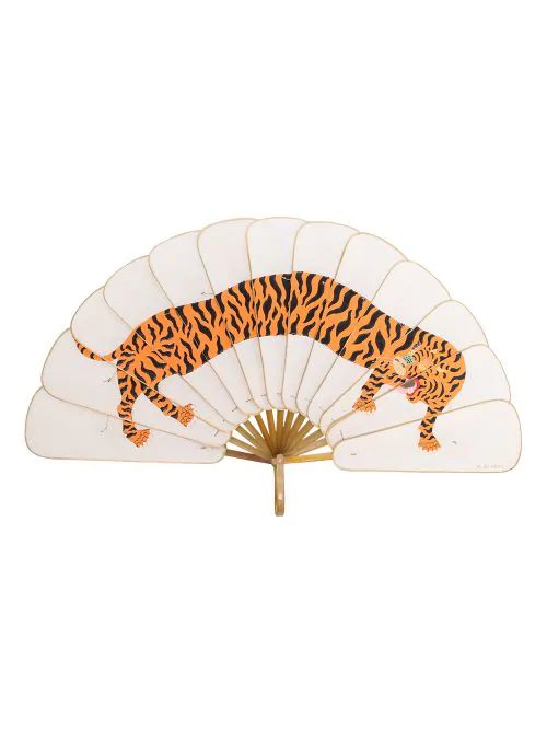 a hand fan with a tiger design on it