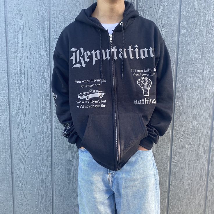 Black Reputation Hoodie Zip-up, with grey puff. Fan-made merch for fans who enjoy the Reputation album and those who are excited for Reputation Taylor's Version.  Zip-Ups may take up to 4 weeks to process but we will be working to get zip-ups packed and shipped to you as quickly as possible! Alternative Black Hoodie For Concert, Black Band Merch Hoodie For Concerts, Alternative Black Hoodie With Letter Print, Alternative Style Black Hoodie With Letter Print, Black Letter Print Sweatshirt For Concert, Band Merch Hoodie With Letter Print For Concert, Black Band Logo Sweatshirt For Streetwear, Black Band Logo Sweatshirt For Winter, Black Sweatshirt With Band Logo For Streetwear