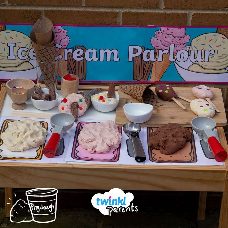 an ice cream parlour is set up on a table