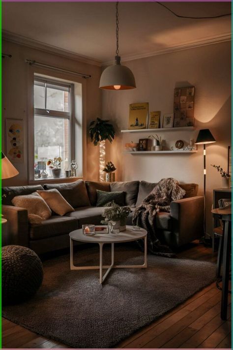 a living room filled with furniture and a lamp on top of a coffee table in front of a window