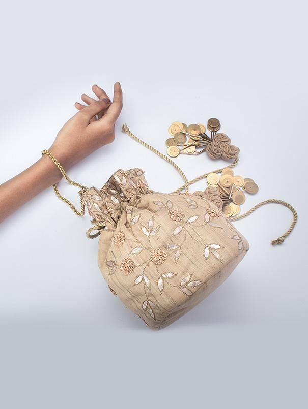 Beige Embroidered Potli bag by Vareli Bafna now available at Trendroots Formal Embroidered Beige Potli Bag, Formal Beige Potli Bag With Pearl Embroidery, Elegant Embroidered Cream Potli Bag, Festive Embroidered Beige Potli Bag, Traditional Embroidered Beige Potli Bag, Pita Work, Potli Bag, Work Email, Embroidered Velvet