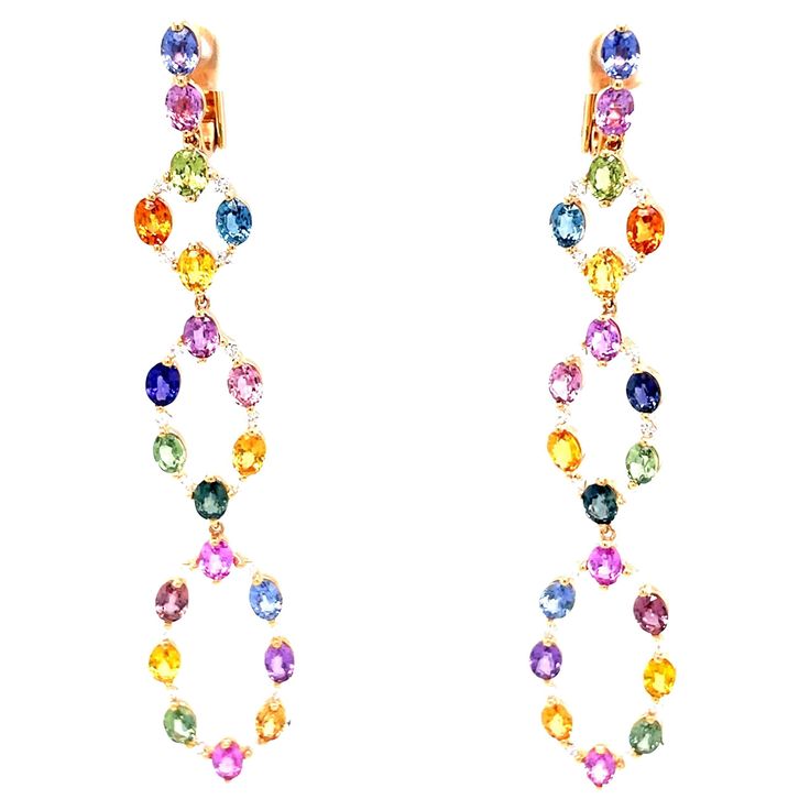 This 18K rose gold elegant chandelier earrings are from our Riad collection. These alluring earrings are made of multi-coloured sapphires in total of 9.95 Carat and natural white diamonds in total of 0.62 Carat. The total metal weight is 8.39 gr. They are 7cm long. Pure elegance! The Riad Collection is the spring/summer 2022 collection of Vitale 1913. Inspired by the colorful oriental gardens of Marrakech, and their geometric shapes, Riad recalls our deep Mediterranean roots and connects them to Gold Diamond Drop Earrings, Round Diamond Pendant, Sapphire Diamond Pendant, Pure Elegance, Colorless Diamond, Elegant Pendant, Rose Gold Pendant, Spring Summer 2022, Brown Diamond