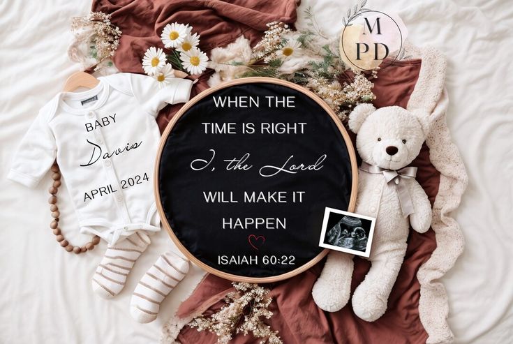 a teddy bear and other items are laying on a bed with a sign that says when the time is right i will make it happen