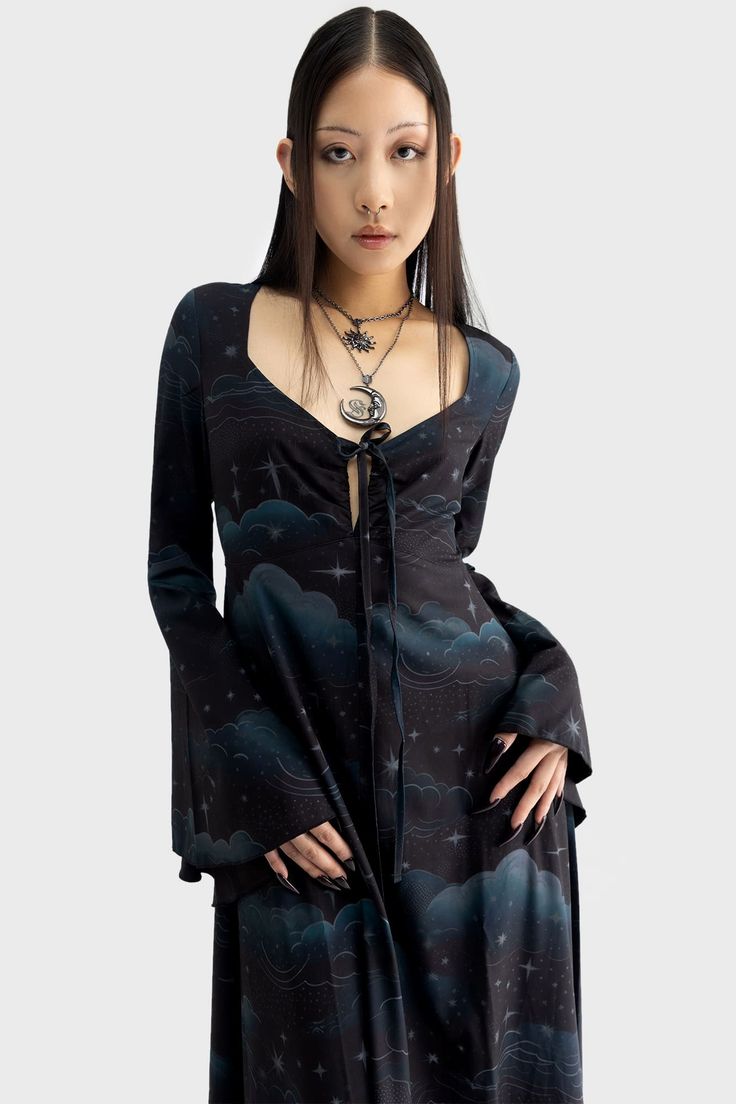 DREAMANICON.- Smooth, slight stretch fabric.- Celestial artwork.- Long flared sleeves.- Maxi length.- Front tie detail.- Back zip closure.- Fitted.With KILLSTAR branding, Main Body: 96% Polyester 4% Elastane, Lining: 95% Polyester 5% Elastane.Machine wash cold (30°c) / Do not bleach / Do not tumble dry / Iron at low temperature / Do not dry clean. Imported. Gothic Plus Size Fashion, Demon Fashion, Witchy Aesthetic Outfit, Clean Goth, Castle Vibes, Witchy Style, Yee Yee, Magical Dress, Boho Hippie Dress