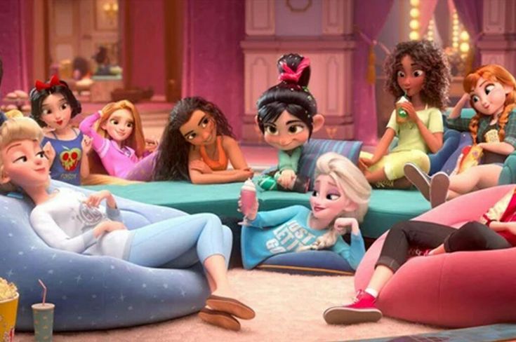 the disney princesses are sitting on couches in front of a table with drinks