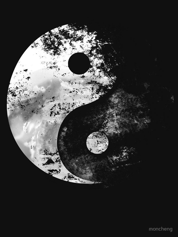 a black and white yin - yang symbol with clouds in the background