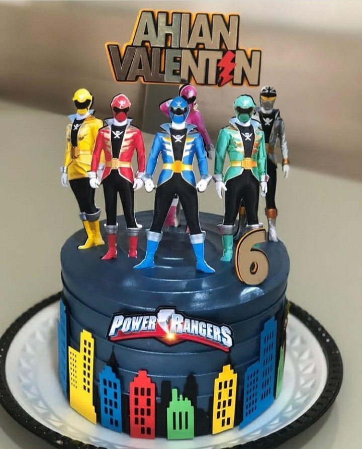 a birthday cake with the power rangers on it