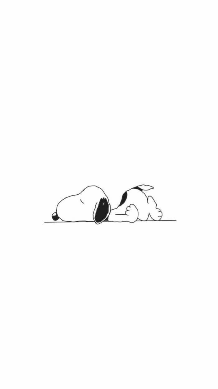 a black and white drawing of a dog laying on the ground with its head down