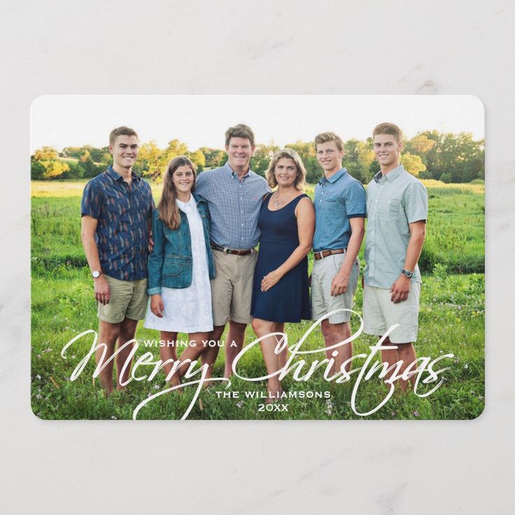 a family christmas card with the words merry christmas on it