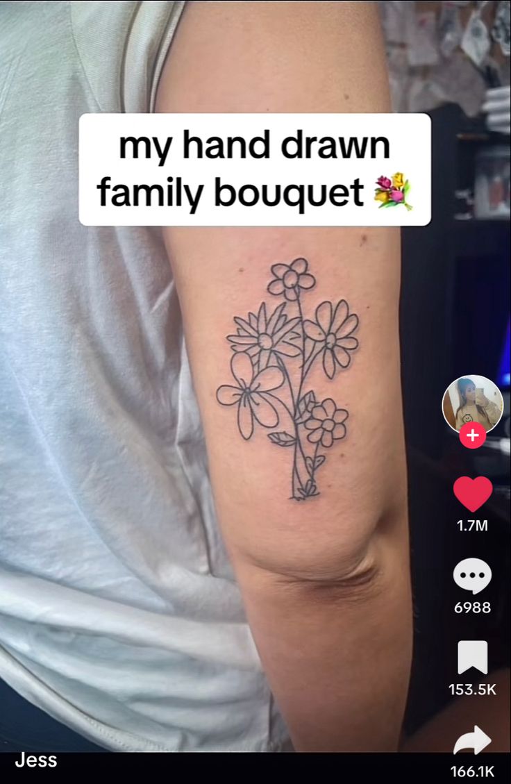 a person with a tattoo on their arm and the caption says, my hand drawn family bouquet