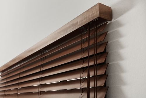 a window with wooden blinds on it