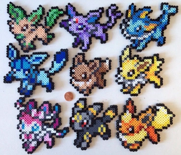 a bunch of pixelated pokemon characters on a white surface