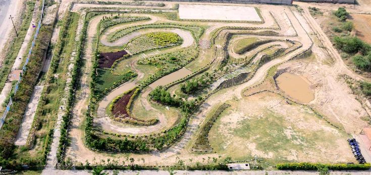 an aerial view of a skate park in the middle of nowhere