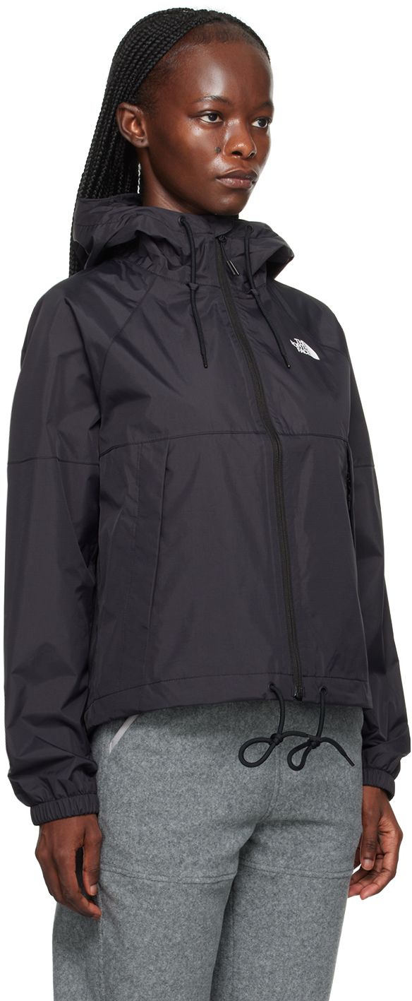 DWR-coated DryVent™ 2L nylon ripstop jacket. Breathable, windproof, and water-repellent. · Drawstring at hood and hem · Stand collar · Zip closure · Logo bonded at chest and back · Zip pockets · Raglan sleeves · Text printed at cuff · Elasticized cuffs · Patch pocket at interior · Partial mesh lining Supplier color: TNF black Waterproof Nylon Track Jacket For Outdoor Activities, Windproof Nylon Track Jacket For Hiking, Nylon Track Jacket With Adjustable Hood For Outdoor Activities, Waterproof Nylon Track Jacket For Hiking, Waterproof Nylon Track Jacket For Outdoor, Nylon Track Jacket With Adjustable Hood For Hiking, Nylon Track Jacket With Adjustable Hood For Outdoor, Hooded Nylon Track Jacket For Hiking, Sporty Nylon Windbreaker For Rainy Weather