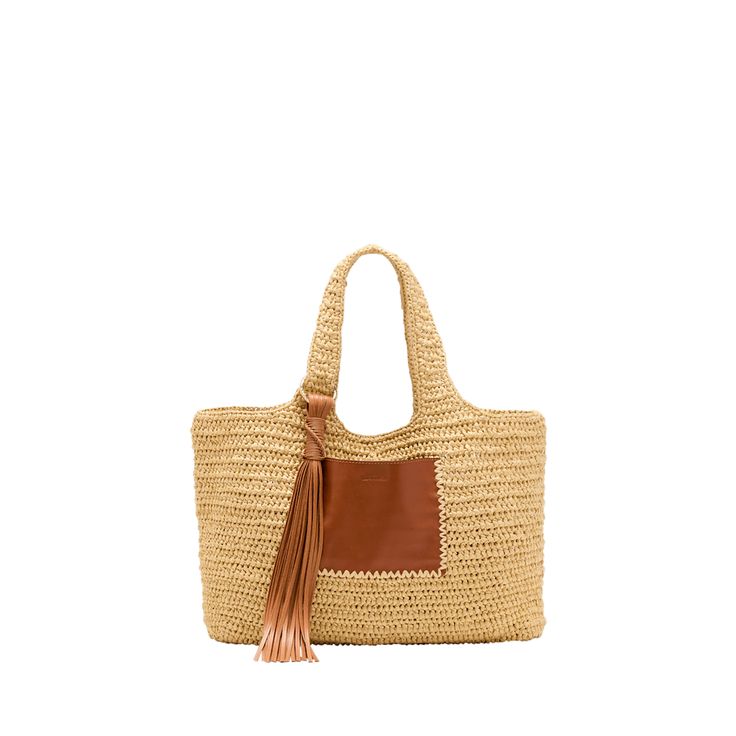 Ulla Johnson "Kamari" tote bag in crochet straw-like polypropylene Shoulder straps with tassel  Open top with self-tie closure  Exterior, one slip pocket  Approx. 11"H x 19.5"W x 4.9"D Imported Vacation Top Handle Woven Crochet Bag, Vacation Woven Crochet Top Handle Bag, Vacation Crochet Top Handle Bag With Woven Details, Crochet Top Handle Bag With Braided Handles For Beach, Beach Crochet Bag With Braided Handles, Crochet Beach Bag With Braided Handles, Natural Travel Bags With Tassels, Natural Color Travel Bags With Tassels, Beige Crochet Bag With Tassels For Travel