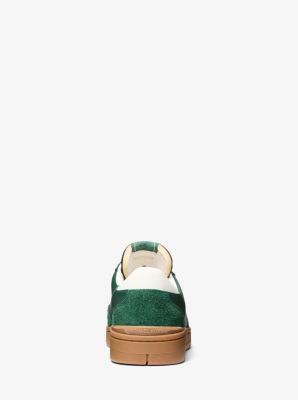 A retro-inspired style with modern appeal, the Wilton lace-up will be a polished addition to your sneaker collection. Featuring a mix of smooth leather and suede, the low-top silhouette is finished with a contrasting rubber sole. Work, weekends, wherever—this shoe goes with everything. Luxury Green Sneakers With Speckled Midsole, Modern Green Sneakers With Textured Sole, Green Leather Functional Sneakers, Green Mid-top Sneakers With Rubber Sole, Luxury Green Suede Sneakers, Suede Trainers, Michael Kors Collection, Suede Sneakers, Sneaker Collection