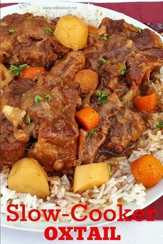 a white plate topped with rice and meat