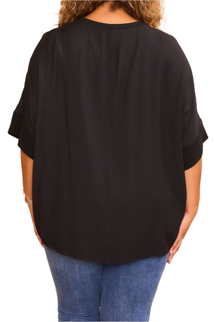 This stylish short sleeve top is designed to elevate your casual wardrobe with ease. Crafted from a blend of 55% polyester and 45% rayon, this top offers a soft and comfortable feel against the skin, making it perfect for everyday wear. The dolman sleeves add a touch of modern flair to the design, with their relaxed and draped silhouette that provides both comfort and style. The short sleeves make this top ideal for warmer weather, keeping you cool and comfortable throughout the day. Adding visual interest, this top features a contrast hem detail in black, creating a chic and sophisticated look. The contrast sleeve hem further enhances the overall design, adding a subtle yet stylish touch to the sleeves. Whether paired with jeans for a casual daytime look or dressed up with trousers for a Dolman Sleeve, Top Sales, Casual Wardrobe, Best Sellers, Short Sleeves Tops, Everyday Wear, Short Sleeves, Dress Up, Wardrobe