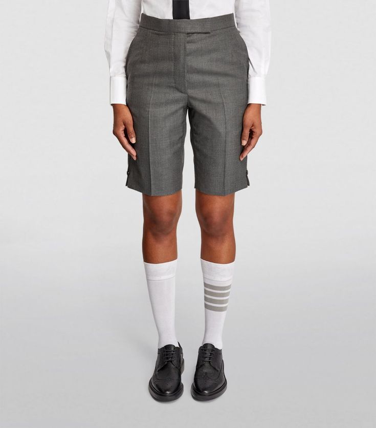 Find THOM BROWNE Wool Tailored Shorts on Editorialist. New York-based label Thom Browne is renowned for its adoration of uniformed dressing - something that comes to the fore in all its expertly tailored separates. No exception, this pair of shorts is cut from comfortable wool to a classic Bermuda silhouette. Pair them with the labels knee-high socks for an ultra-preppy look. Look Bermuda, Distressed Bermuda Shorts, Short Coat Jackets, Tailored Shorts, Preppy Look, Swimwear Shorts, Field Jacket, Knee High Socks, Short Coat