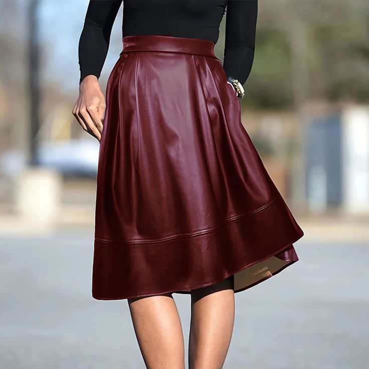 Step into chic style with this Spring Summer Faux Leather A-Line Skirt. Featuring a pleated hem, this elegant and sexy skirt adds a unique twist to your wardrobe. The faux leather material offers a sleek, modern vibe, while the A-line silhouette flatters all body types. Perfect for pairing with heels or boots, this versatile skirt transitions effortlessly from day to night, giving you a standout look for any occasion. Skirt A Line, Fishtail Skirt, Faux Leather Skirt, Leather Pattern, Dress Zipper, Skirt Leggings, Coat Dress, Autumn Summer, Sequin Dress