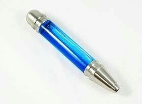 a blue and silver pen sitting on top of a white table