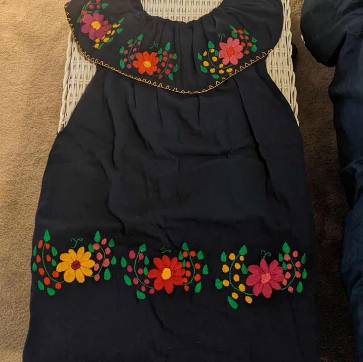 Authentic Mexican Dress. Navy Blue With Colorful Embroidery. Never Worn. Fits A Size Medium. Can Be Worn On The Shoulder Or Off. Blue Spring Dress With Embroidered Border, Spring Blue Dresses With Embroidered Border, Blue Dress With Embroidered Border For Spring, Blue Dresses With Embroidered Border For Spring, Traditional Blue Embroidered Dress With Embroidered Hem, Traditional Blue Dress With Embroidered Hem, Blue Cotton Dress With Embroidered Border, Blue Folk Embroidered Dress, Mexican Dress