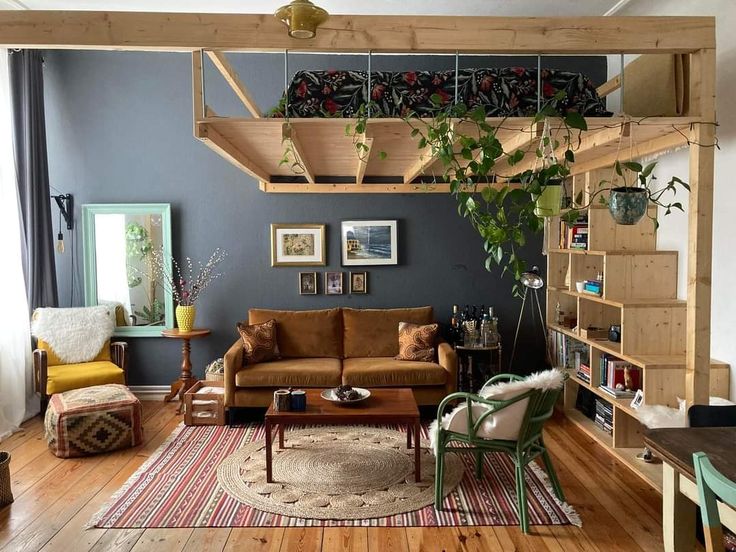 a living room filled with furniture and plants