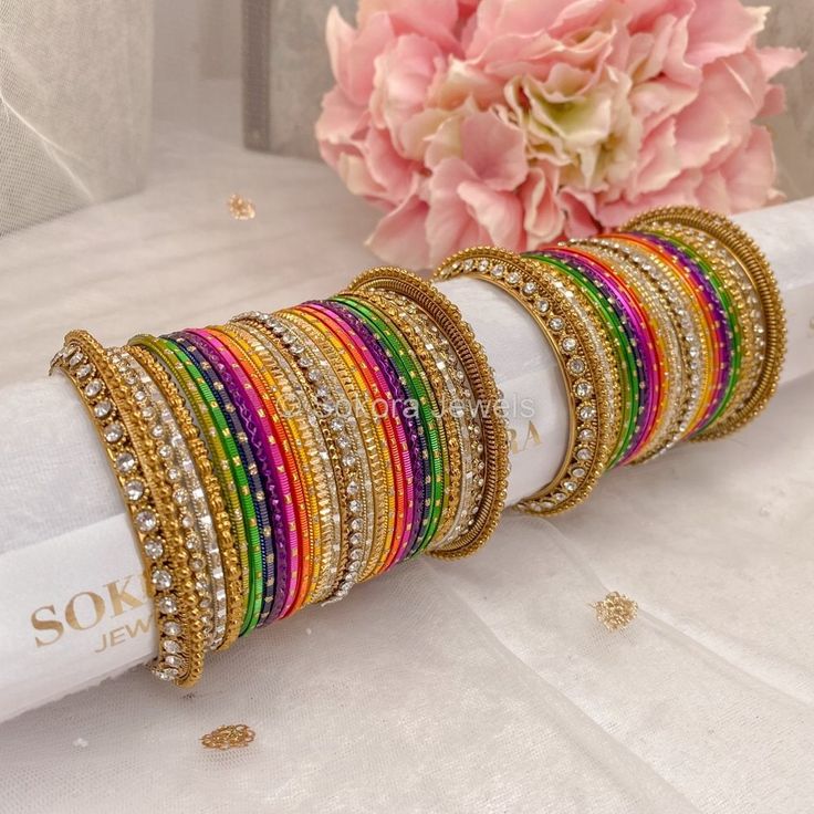 Large stack of antique Gold bangles with all the colours or the rainbow!  Ready to Ship! Multicolor Bangle Bracelets For Celebration, Multicolor Bangle Bracelet For Celebration, Multicolor Round Bangle For Party, Multicolor Party Bangle, Bohemian Multicolor Stackable Bangle, Antique Gold Bangles, Bangle Stack, Silk Bangles, Rainbow Colour