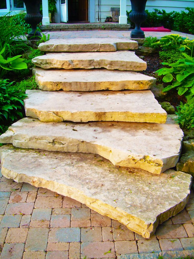 stone steps leading up to a house