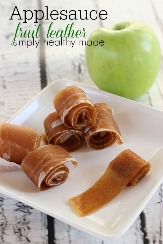 applesauce fruit leather simply healthy made on a white plate next to an apple