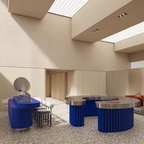 an office with blue and white furniture in the middle of it's flooring